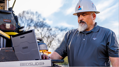 Utility worker on laptop
