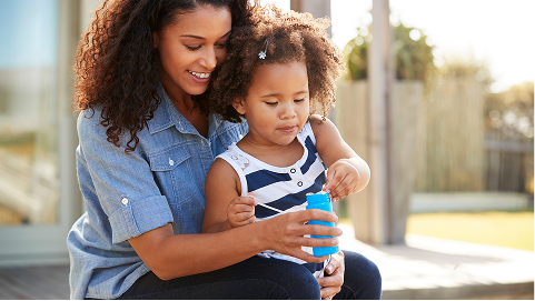 Mother and child playing
